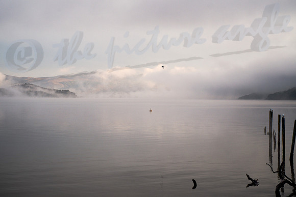 mist lifting off the lake